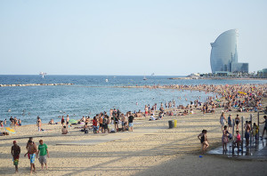 The beech at Barceloneta looking back towards the centre of Barcelona with the W luxury hotel on the right of the horizon